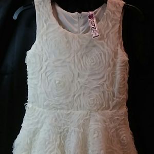Rosette lace girls dress by Beautees. Includes a gold glitter belt.